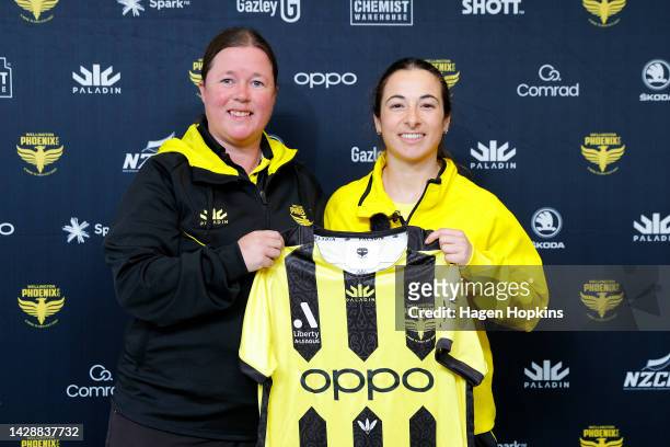 New signing Michaela Robertson is presented with a shirt by head coach Natalie Lawrence during a Wellington Phoenix A-League Womens media opportunity...