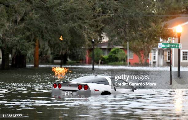 Car sits in floodwater after Hurricane Ian on September 29, 2022 in Orlando, Florida. The hurricane brought high winds, storm surge and rain to the...