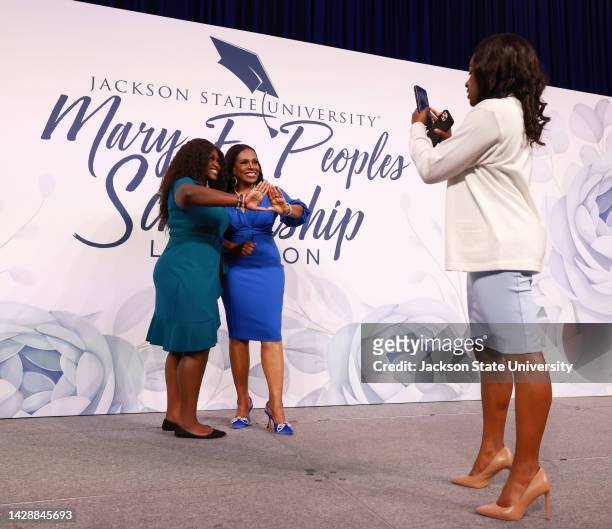 Sheryl Lee Ralph strikes a pose with a JSU student and her Delta Sigma Theta Sorority sister during the Mary E. Peoples Scholarship Luncheon at...