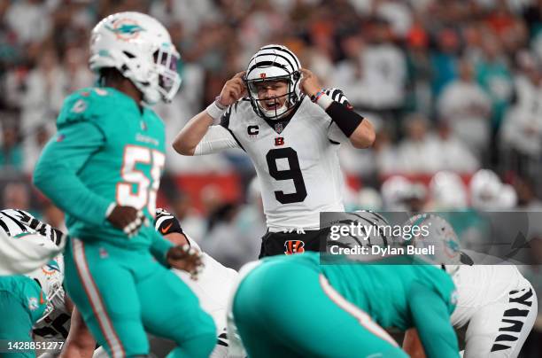Quarterback Joe Burrow of the Cincinnati Bengals prepares to snap the ballduring the 1st quarter of the game against the Miami Dolphins at Paycor...