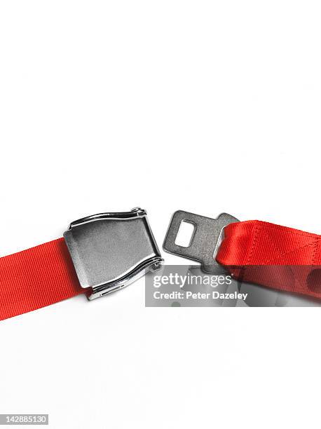 red seat belt unfastened, angle - vastmaken stockfoto's en -beelden