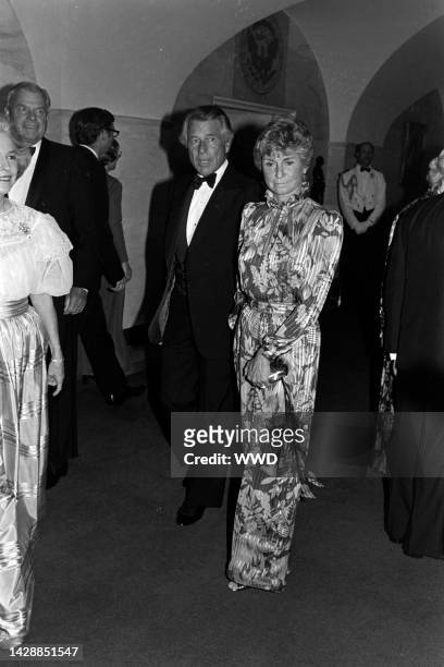 Efrem Zimbalist Jr. Loranda Stephanie Spaulding attend an event at the White House in Washington, D.C., on May 21, 1981.