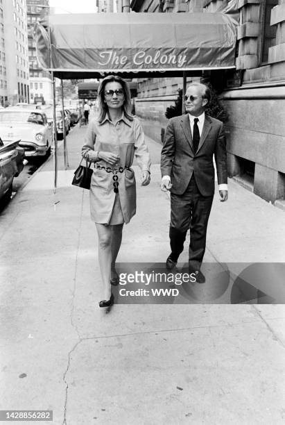 Socialite Lee Radziwill and writer Truman Capote pose for portraits as they leave The Colony restaurant on September 3, 1968 in New York City.