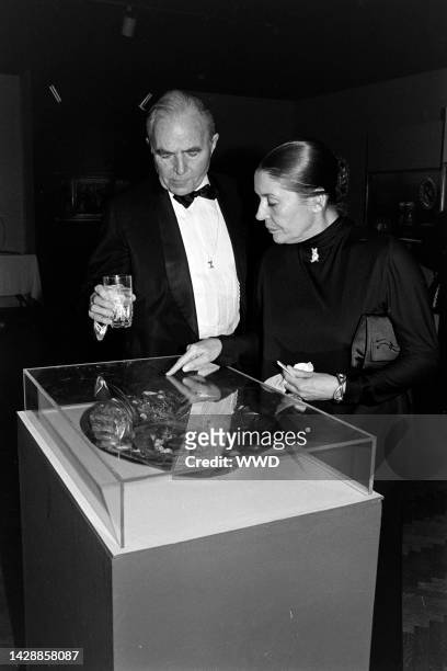 James Mason and Clarissa Kaye attend a party at the Corcoran Gallery in Washington, D.C., on January 5, 1981.