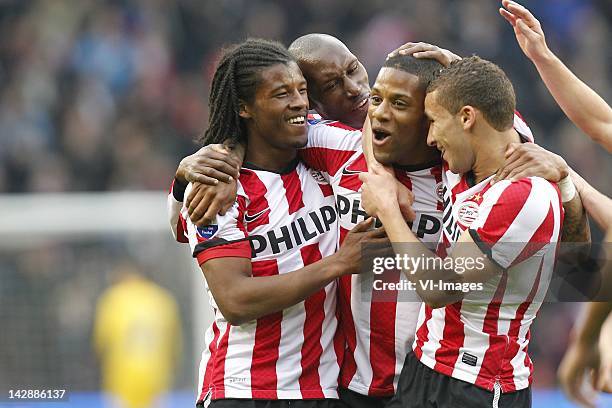 Goalscorer Jeremain Lens of PSV celebrates with Georginio Wijnaldum , Zakaria Labyad and team-mates during the Dutch Eredivisie match between PSV...