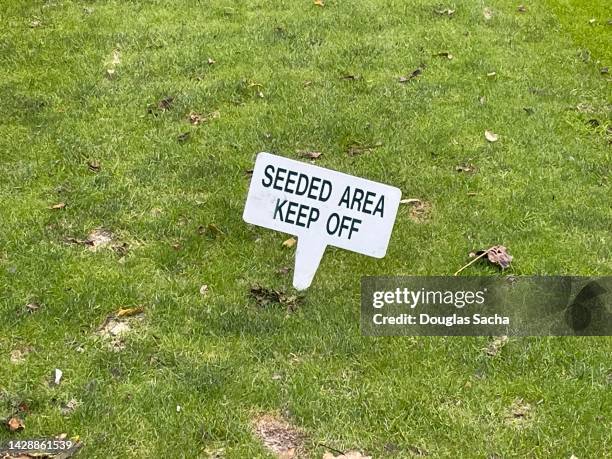 close-up of a keep off sign on a repaired golf course - lawn sign stock pictures, royalty-free photos & images