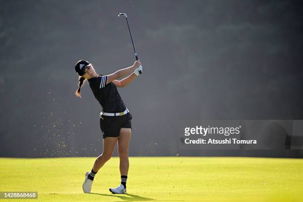 Haruka Morita of Japan hits her second shot on the 12th hole during the second round of the Japan Women's Open Golf Championship at Murasaki Country...
