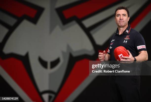 Newly appointed Essendon Bombers AFL coach Brad Scott poses for the media during a press conference at The Hangar on September 30, 2022 in Melbourne,...
