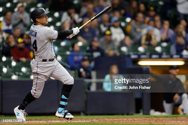 Avisail Garcia of the Miami Marlins hits a three run homer in the eighth inning against the Milwaukee Brewers at American Family Field on September...