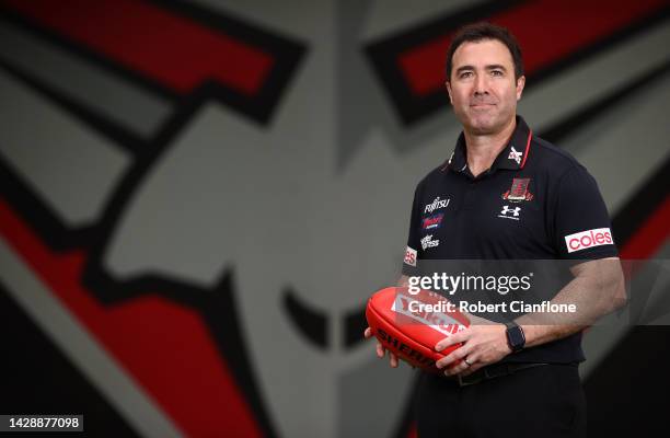 Newly appointed Essendon Bombers AFL coach Brad Scott poses for the media during a press conference at The Hangar on September 30, 2022 in Melbourne,...