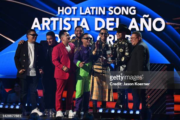 Grupo Firme accepts the award for Hot Latin Song onstage during the 2022 Billboard Latin Music Awards at Watsco Center on September 29, 2022 in Coral...