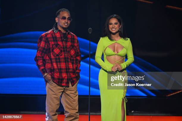 Ozuna and Becky G speak onstage during the 2022 Billboard Latin Music Awards at Watsco Center on September 29, 2022 in Coral Gables, Florida.