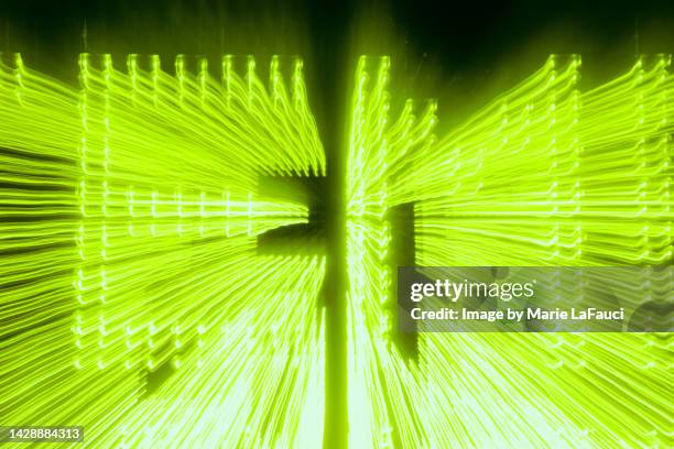 abstract neon green lighting - alphabet neon stock pictures, royalty-free photos & images