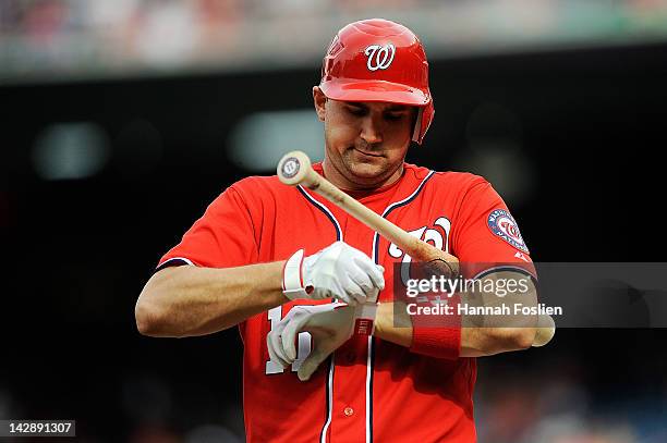 Ryan Zimmerman of the Washington Nationals adjusts his batting gloves during the first inning against the Cincinnati Reds at Nationals Park on April...