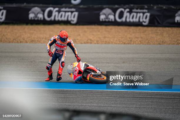 Marc Marquez of Spain and Repsol Honda Team crashes at the beginning of the session during the free practice of the MotoGP OR Thailand Grand Prixat...