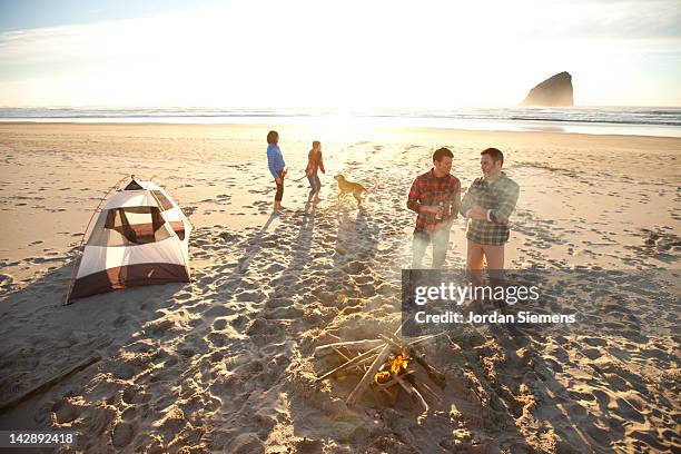 group of friends camping. - newfriendship stock pictures, royalty-free photos & images