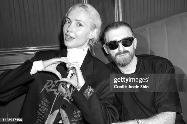 Designer Demna Gvasalia poses with a guest at the "VTMNTS Uncensored" Art Book by Slava Mogutin & Guram Gvalia Launch as part of Paris Fashion Week...