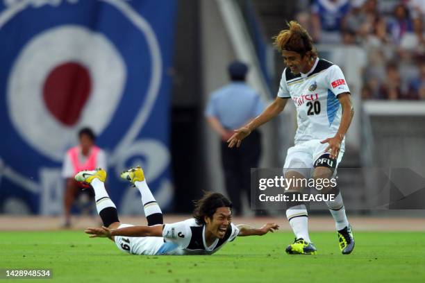 Kosei Shibasaki of Kawasaki Frontale celebrates scoring his side's first goal with his teammate Junichi Inamoto during the J.League J1 match between...