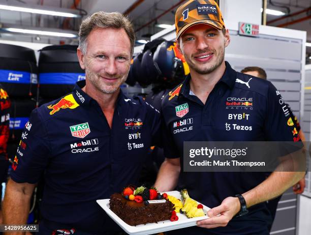 Max Verstappen of the Netherlands and Oracle Red Bull Racing is presented with a birthday cake for his 25th birthday by Red Bull Racing Team...