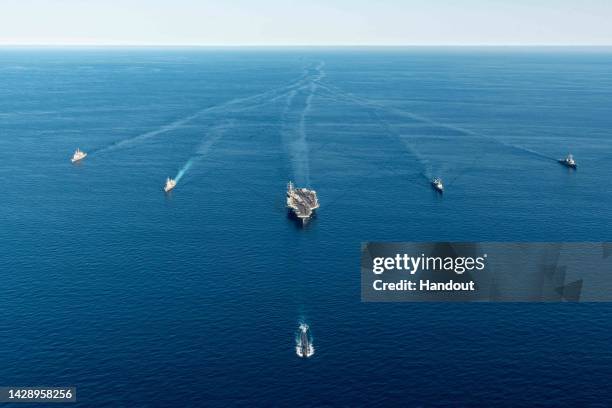 In this handout image provided by the South Korean Defense Ministry, The submarine USS Annapolis , ​U.S. Nuclear-powered aircraft carrier Ronald...