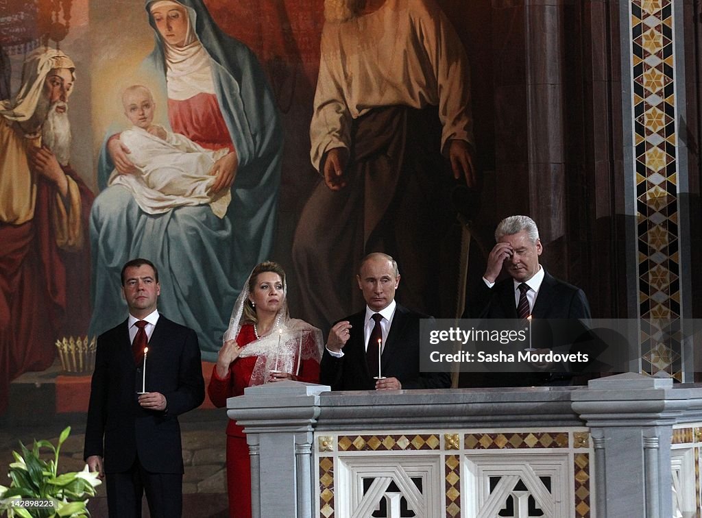 Putin And Medvedev Attend Easter Service