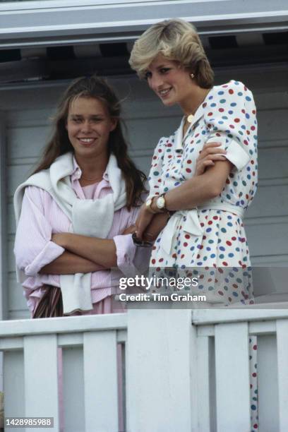 Princess Diana with Lady Sarah Armstrong-Jones watching the polo at Windsor, England, United Kingdom, 24th July 1983.