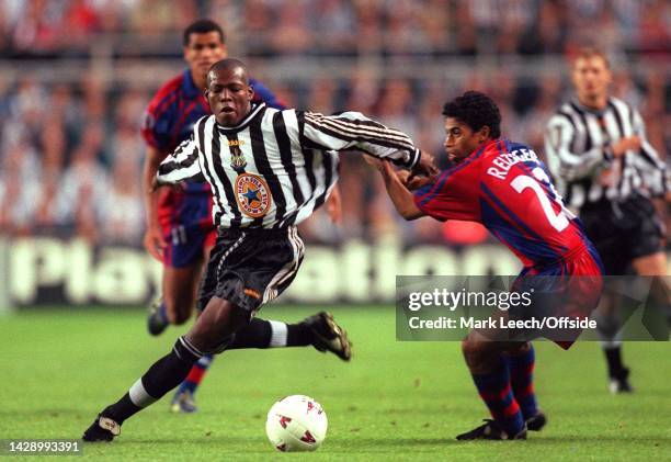Champions League 1997/98, Newcastle United v Barcelona. Faustino Asprilla shrugs off Michael Reiziger.