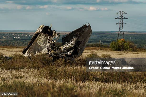 Wreckage of destroyed Ukrainian plane lies in a field near the Izium-Sloviansk highway on September 22, 2022 in Kharkiv Oblast, Ukraine. Almost 70%...