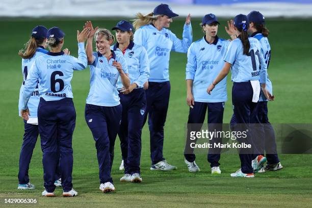 The NSW Breakers celebrate victory during the WNCL match between New South Wales and Western Australia at North Sydney Oval, on September 30 in...
