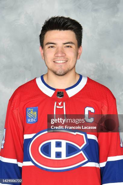 Nick Suzuki of the Montreal Canadiens poses for his official headshot for the 2022-2023 season on September 19, 2022 at the Bell Sports Complex in...