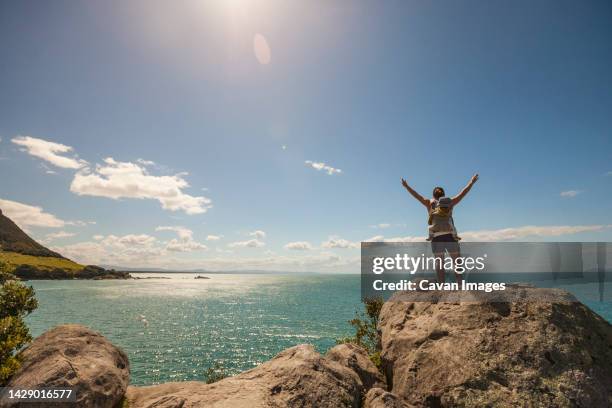 hiking on leisure island, bay of plenty, new zealand - mount maunganui stock pictures, royalty-free photos & images