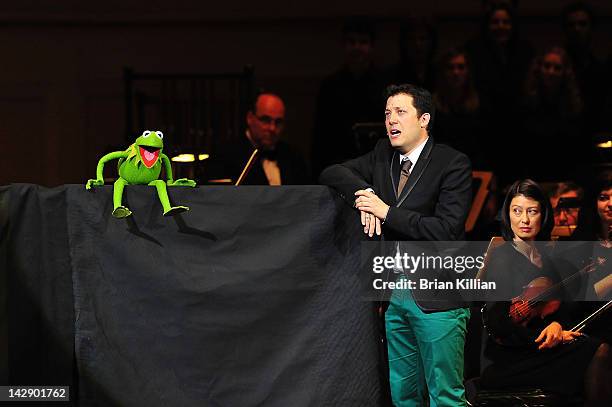 Host John Tartaglia performs with Kermit the Frog during The New York Pops Present "Jim Henson's Musical World" at Carnegie Hall on April 14, 2012 in...