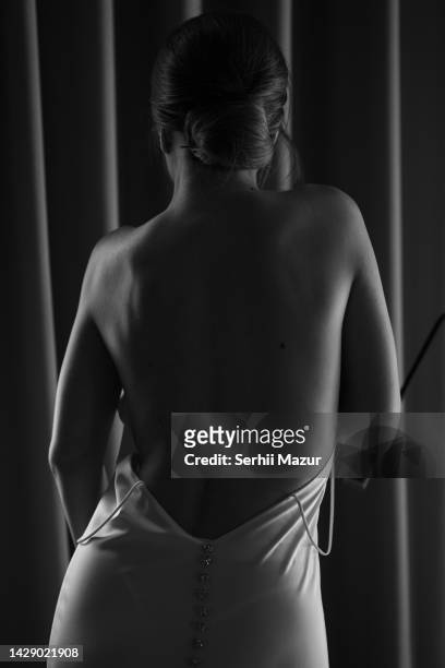 woman with naked back   - stock photo - marriage equality stock pictures, royalty-free photos & images
