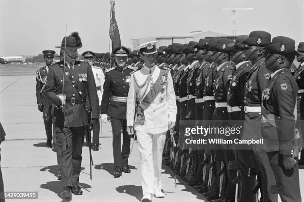Prince Charles, Prince of Wales visits a military camp during a trip in the Republic of Zimbabwe to attend the country's independence ceremony, 18th...