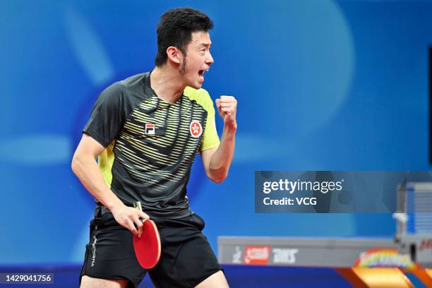 Wong Chun-ting of Hong Kong reacts against Lakatos Tamas of Hungary during the Men's Group match between Hong Kong and Hungary on Day 1 of 2022 ITTF...