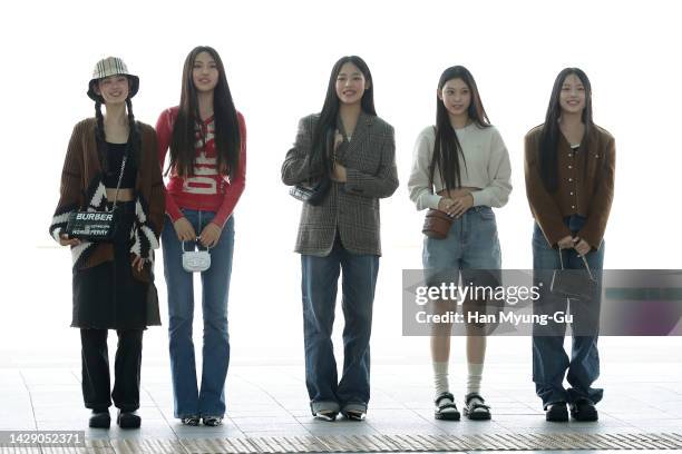 Members of girl group NewJeans is seen on departure at Incheon International Airport on September 30, 2022 in Incheon, South Korea.