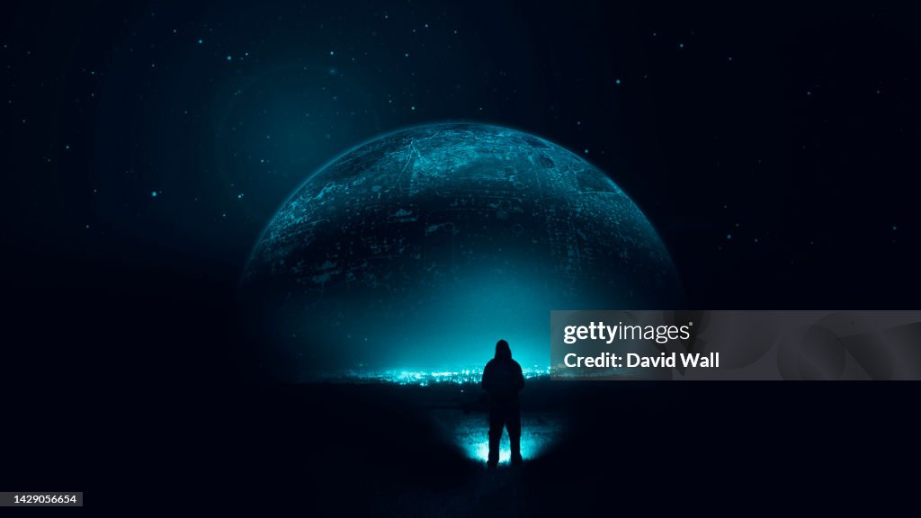 A science fiction concept of a man looking up at a glowing alien planet in the night sky.