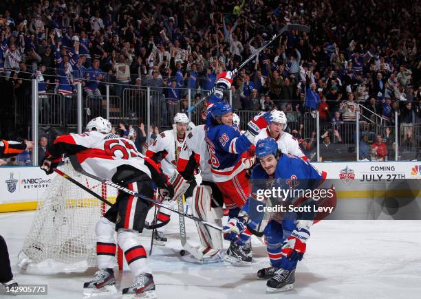 Brian Boyle of the New York Rangers celebrates his third period goal against Craig Anderson of the Ottawa Senators in Game Two of the Eastern...