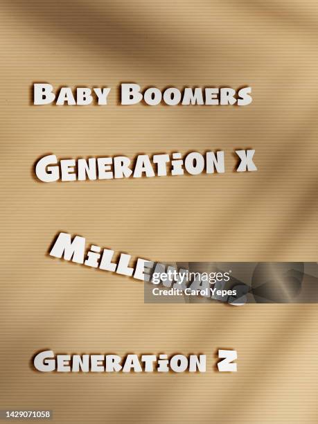 boomers, generation x, millenials message in paper work - x世代 ストックフォトと画像