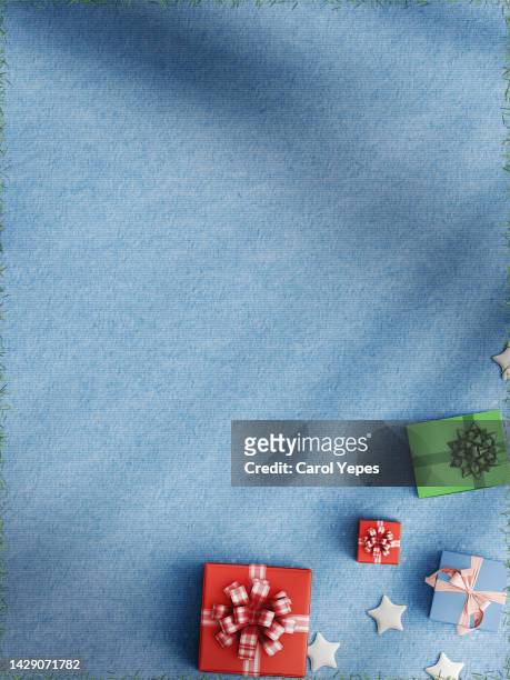top view christmas gifts on blue pastel surface - surface preparation stock pictures, royalty-free photos & images