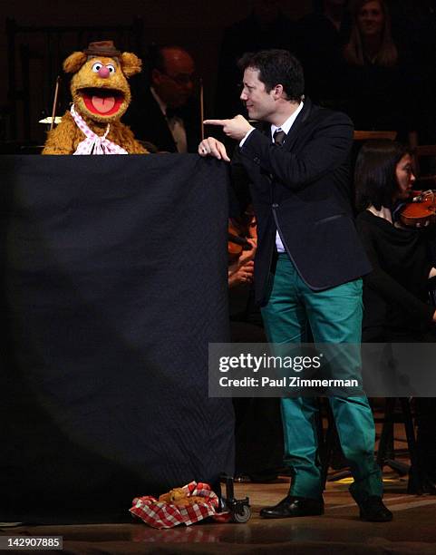 Fozzie Bear and host John Tartaglia perform during The New York Pops Present "Jim Henson's Musical World" at Carnegie Hall on April 14, 2012 in New...