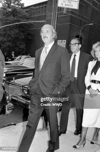 Michael Bergerac, Alan Greenspan, and Barbara Walters attend a service at the Church of St. Vincent Ferrer in New York City on September 14, 1983.