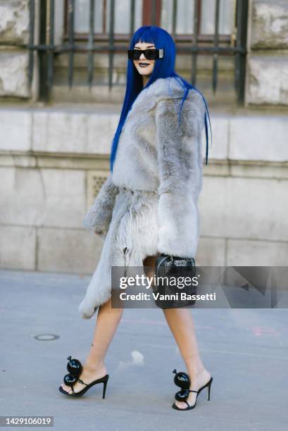 Sita Abellan poses wearing Loewe after the Loewe show at the Garde Republicaine during Paris Fashion Week - Womenswear Spring/Summer 2023 on...