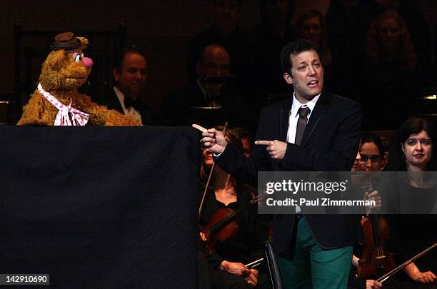 Fozzie Bear and host John Tartaglia perform during The New York Pops Present "Jim Henson's Musical World" at Carnegie Hall on April 14, 2012 in New...