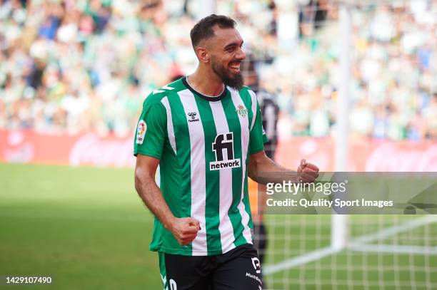 Borja Iglesias of Real Betis celebrates after scoring his team's first goal during the LaLiga Santander match between Real Betis and Girona FC at...