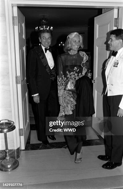 Mike Connors and Marylou Connors attend an event, welcoming the president of Portugal, at the White House in Washington, D.C., on September 15, 1983.