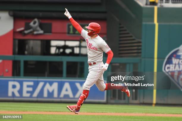 Rhys Hoskins of the Philadelphia Phillies celebrates hitting a solo home run in the first inning during game one of a doubleheader baseball game...