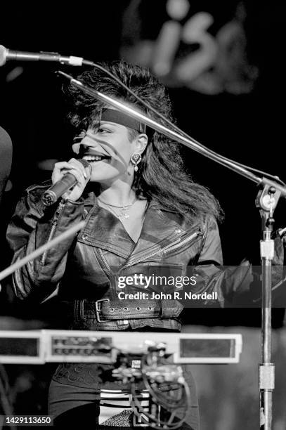 American singer and actress Lisa Lisa, of the urban contemporary band Lisa Lisa and Cult Jam, performs on stage during a concert on November 5, 1987...