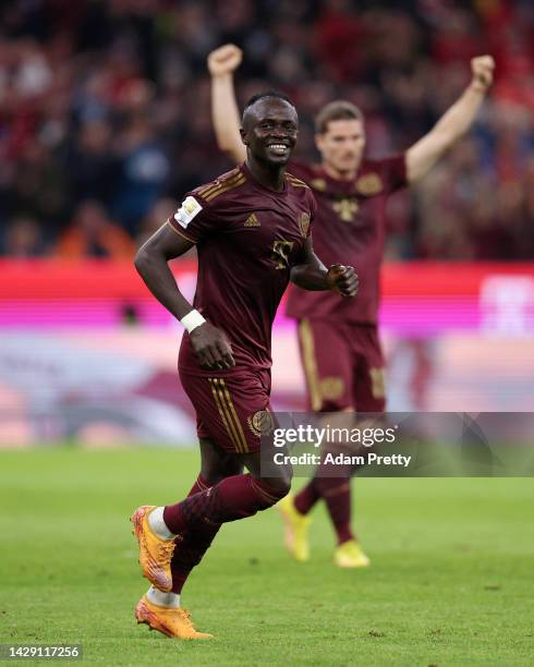 Sadio Mane of Bayern Munich celebrates scoring their side's third goal during the Bundesliga match between FC Bayern München and Bayer 04 Leverkusen...