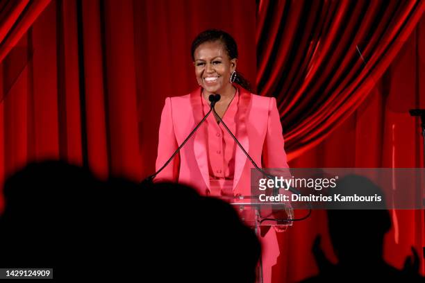 Former First Lady Michelle Obama speaks onstage at the Clooney Foundation For Justice Inaugural Albie Awards at New York Public Library on September...